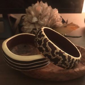 A pair of chunky, bracelets